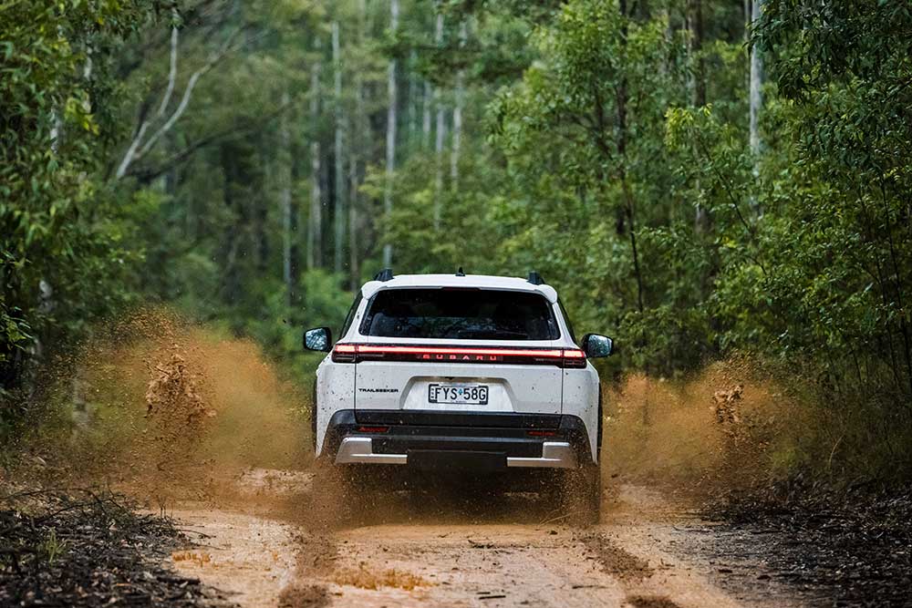 2026 Subaru Trailseeker driving through mud.