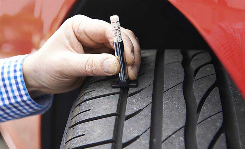 testing tread depth on a tyre