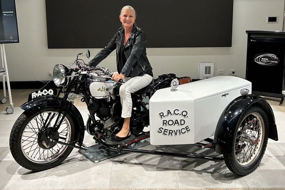Leona Murphy on an AJS motorcycle from RACQ's historic fleet.