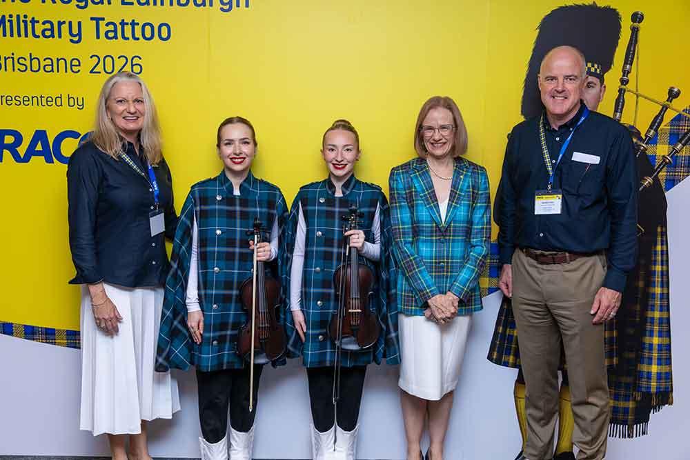 Leona Murphy at the Royal Edinburgh Military Tattoo in Brisbane with two performers and Queensland Governor Jeannett Young and RACQ Managing Director and CEO David Carter.